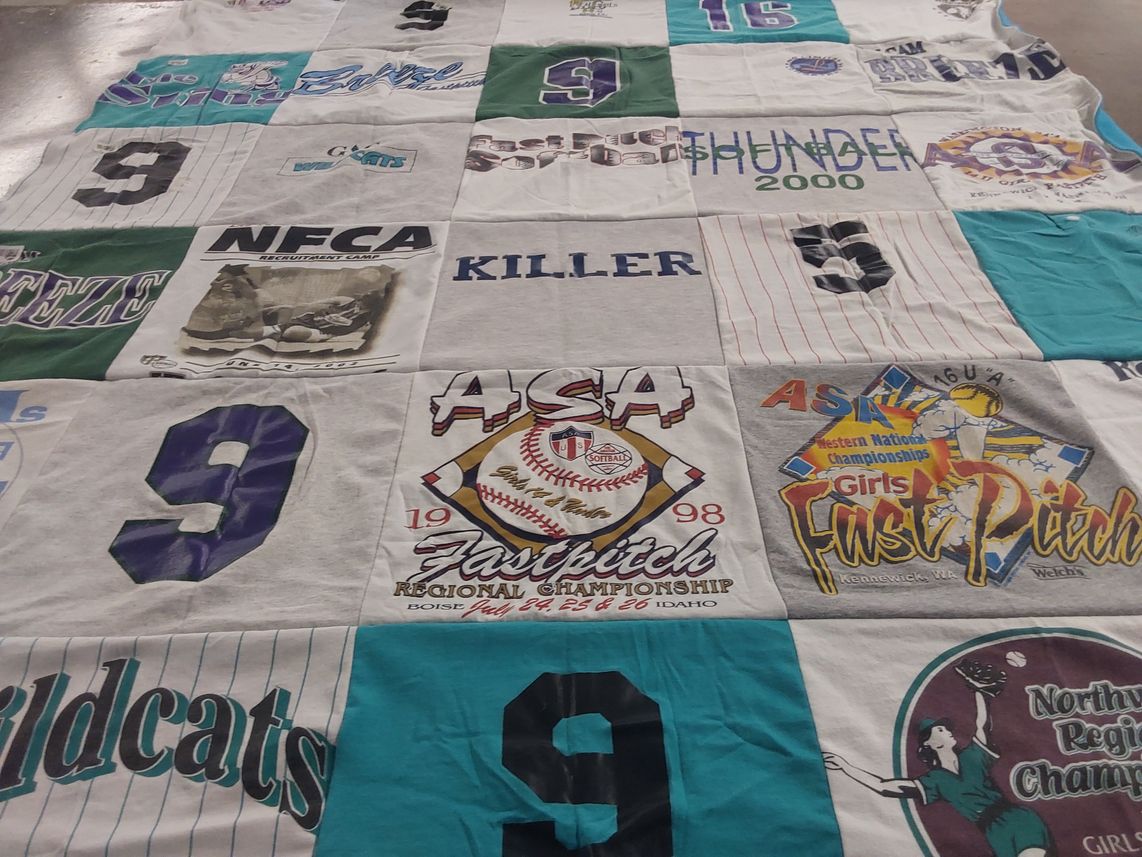 T-shirt quilt with softball, sports themes by Ann from WA