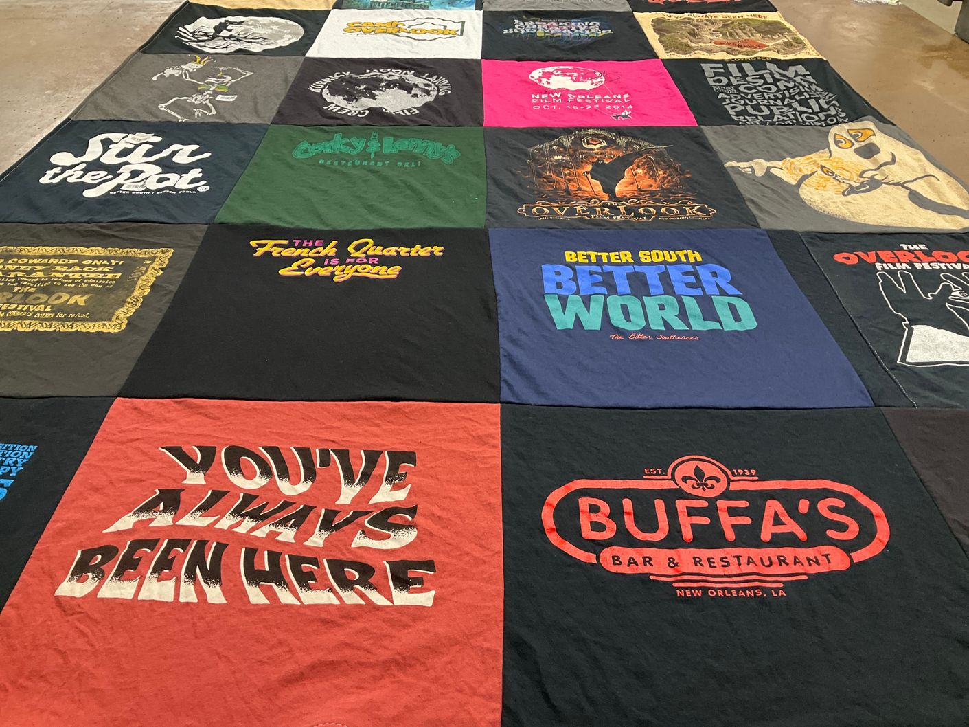 T-shirt quilt with food, film themes by Caleigh from IA