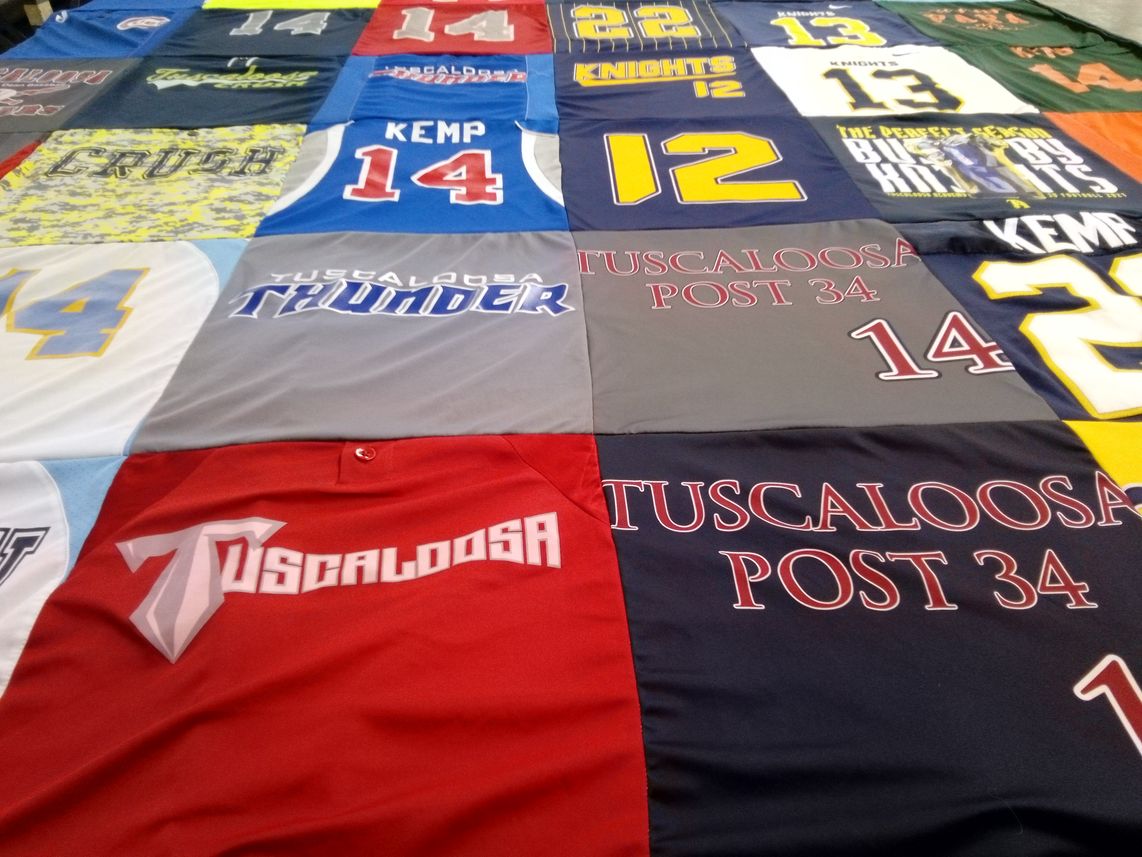 T-shirt quilt with sports, community themes by Laurie from AL