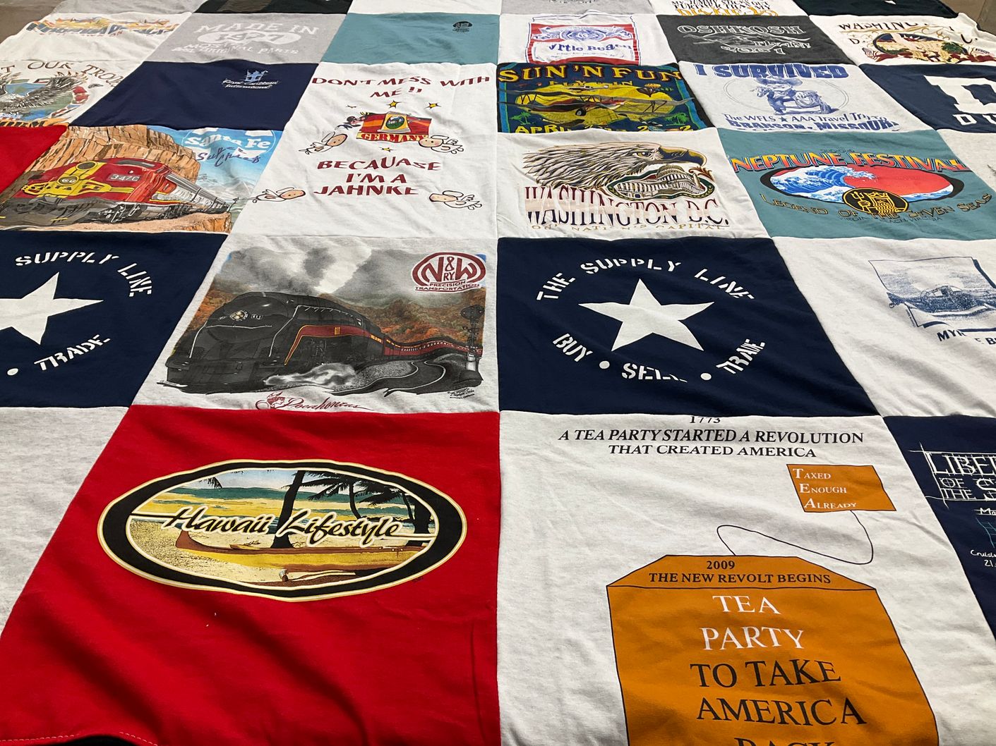 T-shirt quilt with trains, politics themes by Kim from VA