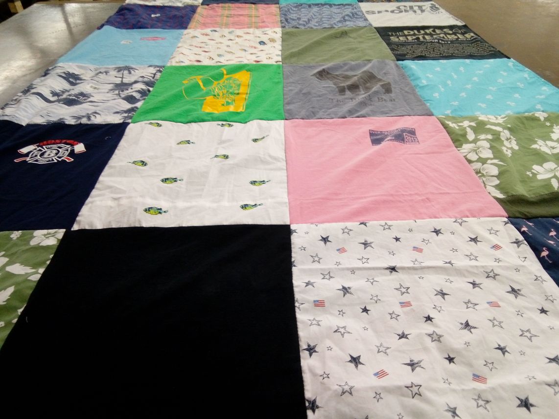 T-shirt quilt with fishing, hockey themes by Thomas from MA