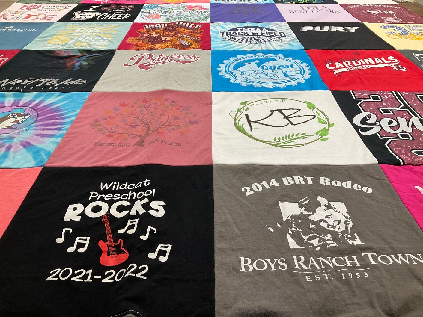 T-shirt quilt with preschool, rodeo themes by Kathy from TN