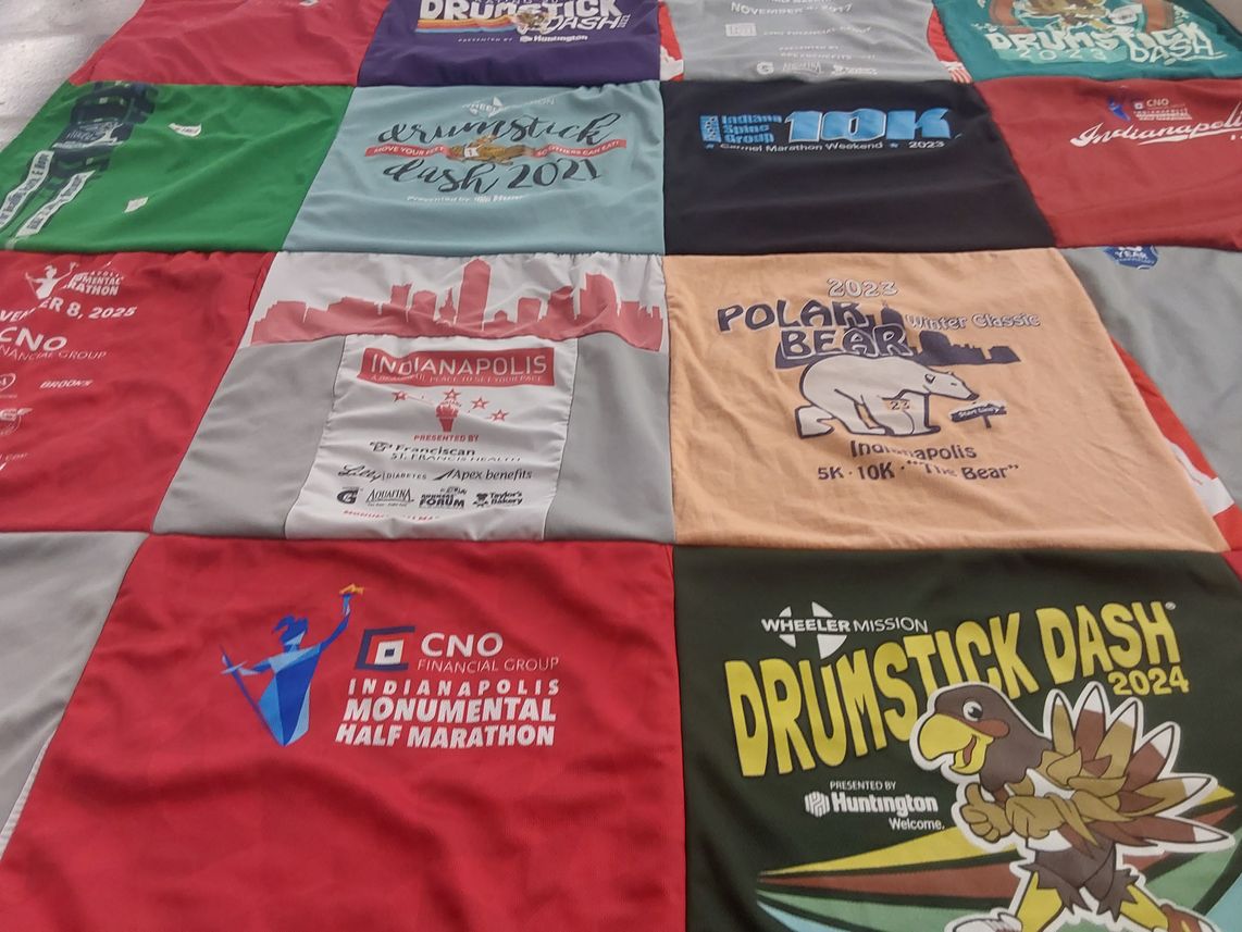 T-shirt quilt with running, fitness themes by Katie from IN