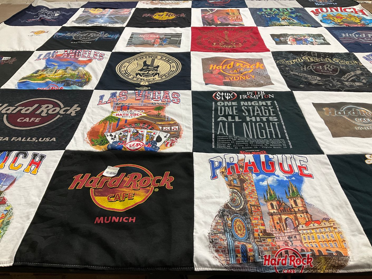 T-shirt quilt with music, tourism themes by Michele from TX