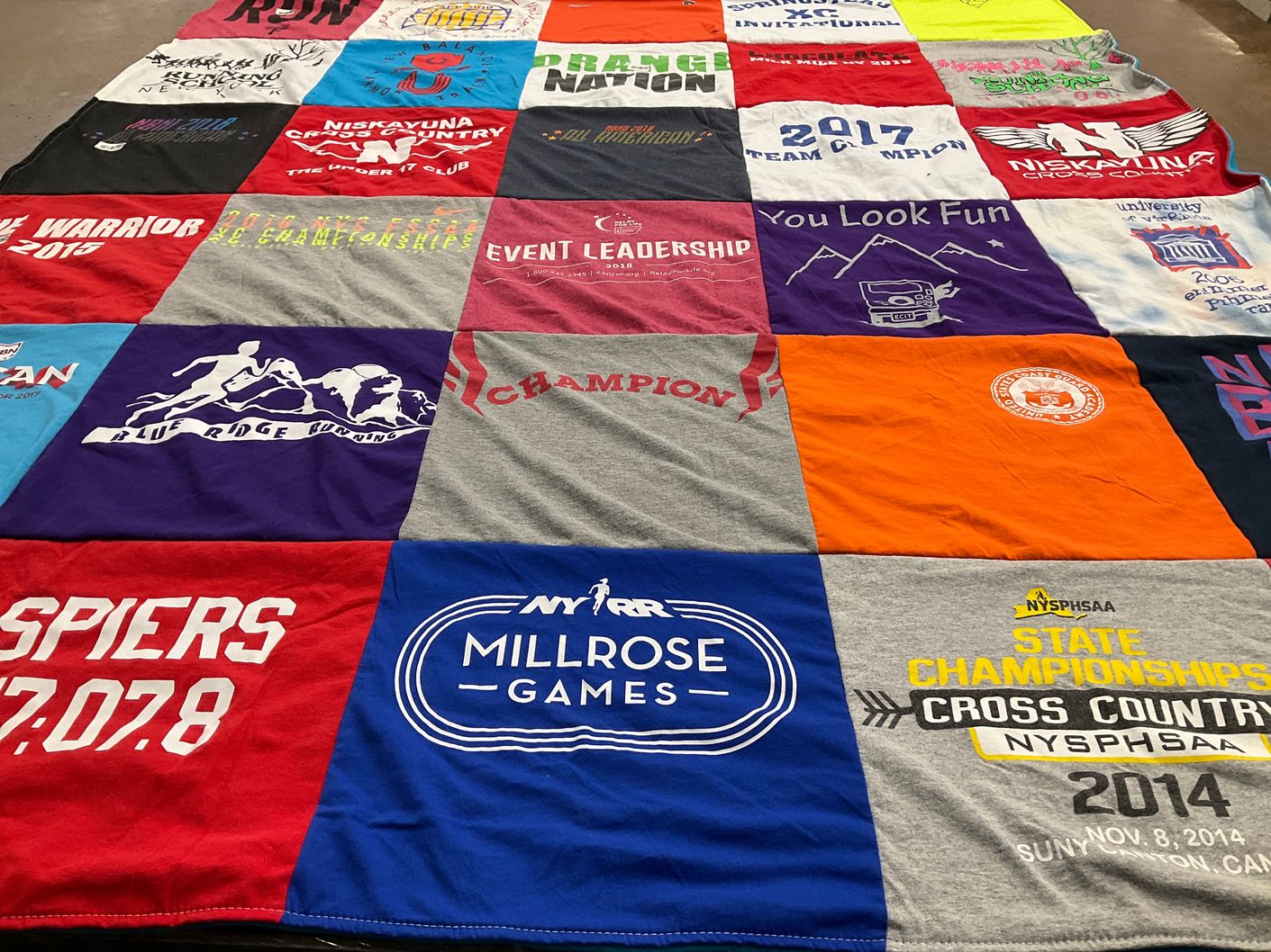 T-shirt quilt featuring blue ridge running team by Anna from NH
