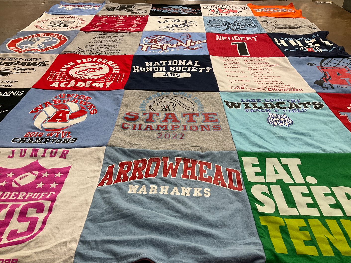 T-shirt quilt featuring arrowhead warhawks, lake country wildcats by Nicole from WI