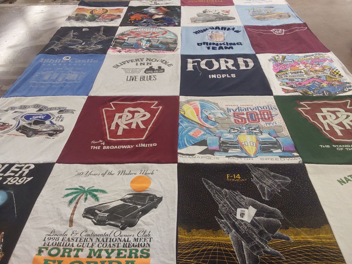 T-shirt quilt with cars, motorsports themes by Sandra from NC
