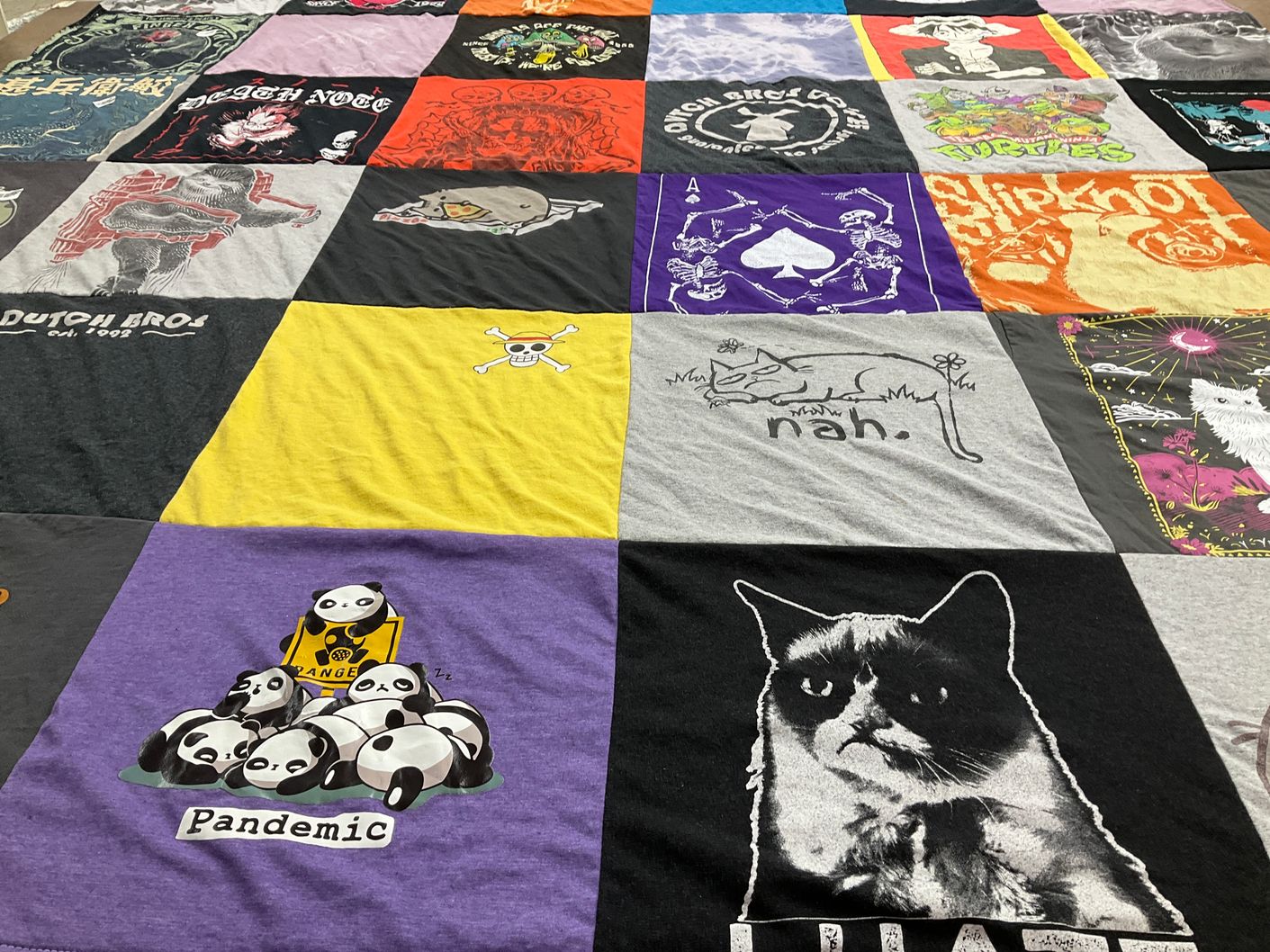 T-shirt quilt with anime, music themes by Casey from OR