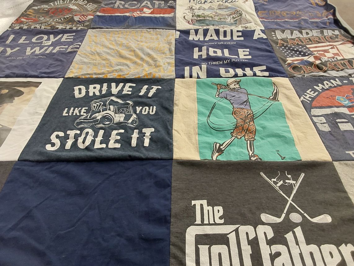 T-shirt quilt with golf, travel themes by Anita from CA