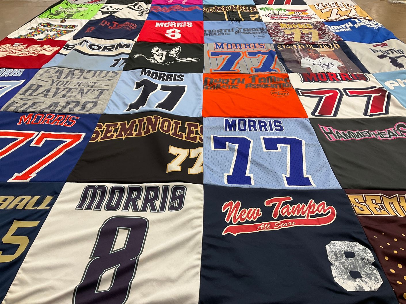 T-shirt quilt with sports, athletics themes by Michelle from FL