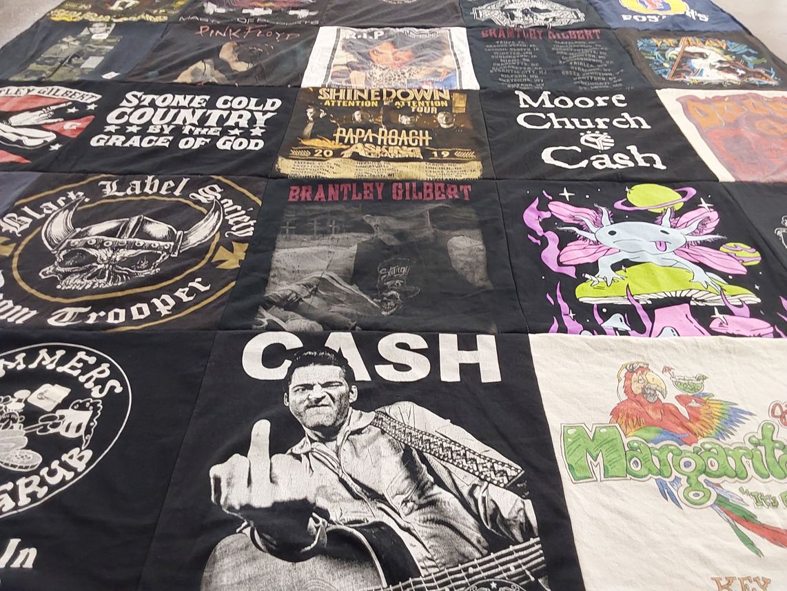 T-shirt quilt with country music, rock music themes by sue from IN