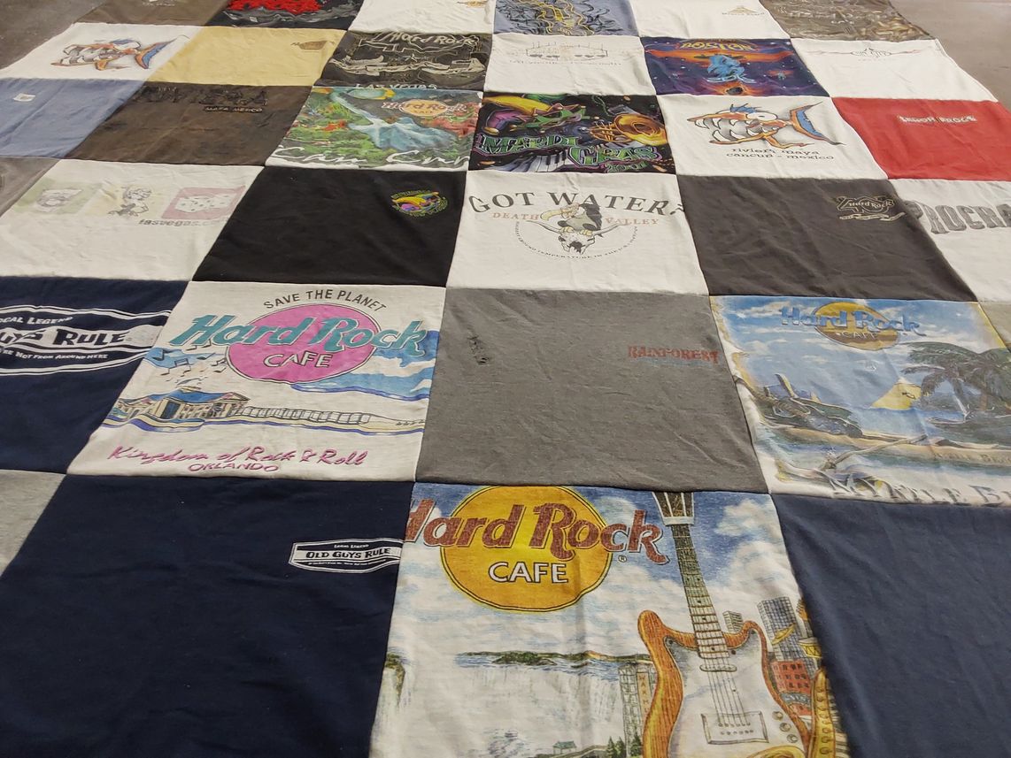 T-shirt quilt with music, travel themes by Dennis from OH