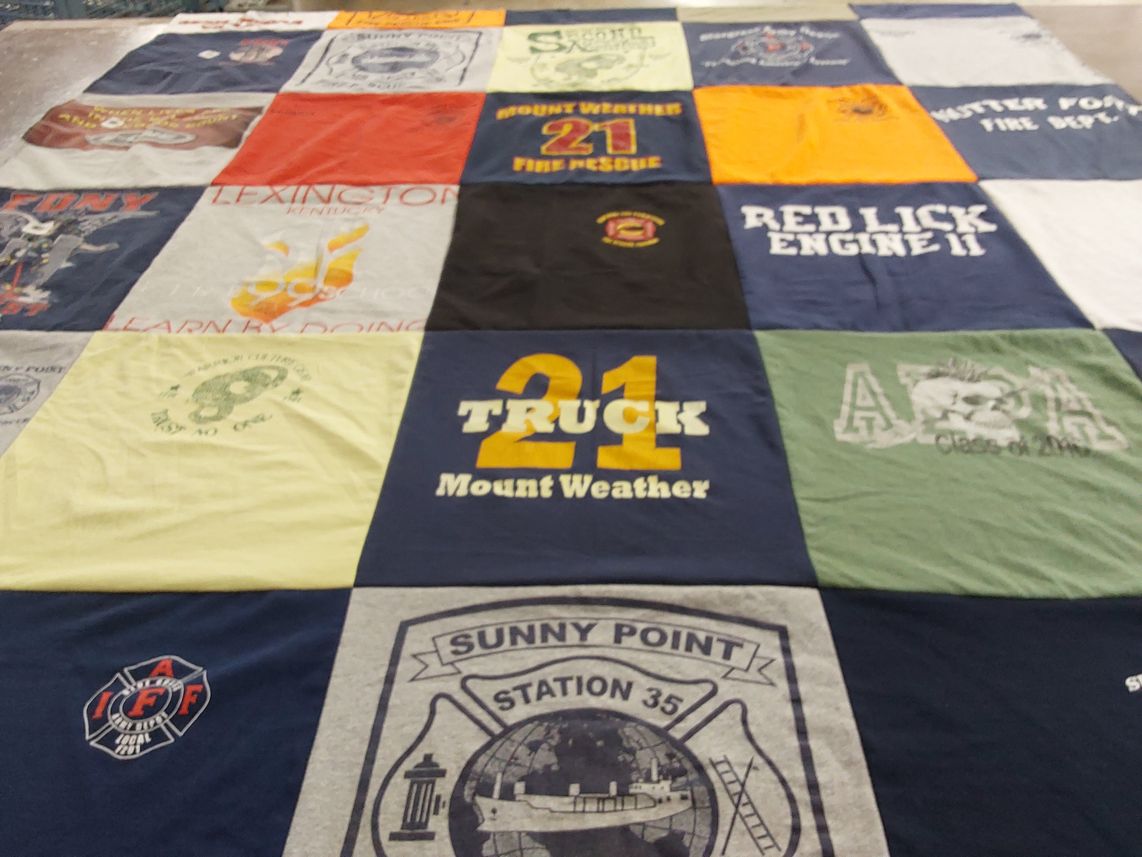T-shirt quilt with firefighting, community service themes by Jeremy from NC
