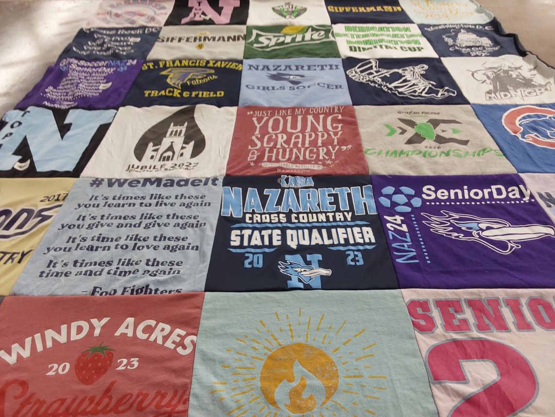 T-shirt quilt featuring nazareth cross country, nazareth soccer by Emily from IL