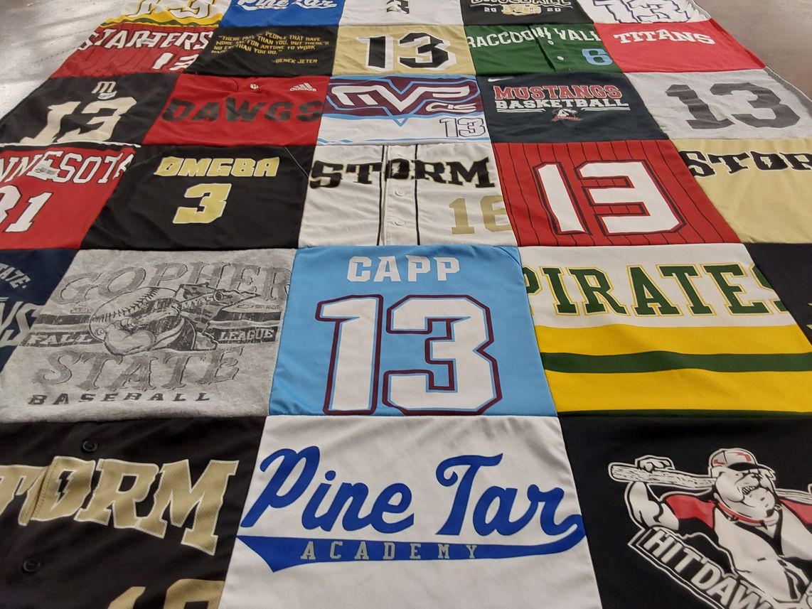T-shirt quilt featuring raccoon valley titans, copper state pirates by Kelly from MN