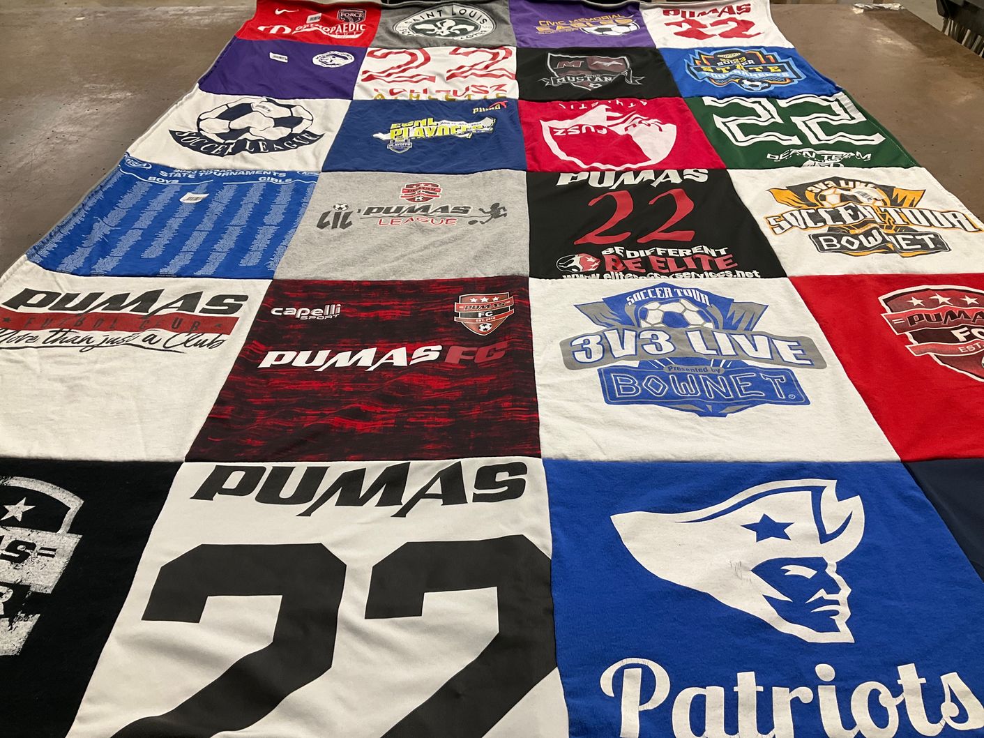 T-shirt quilt featuring pumas fc by Robyn from IL
