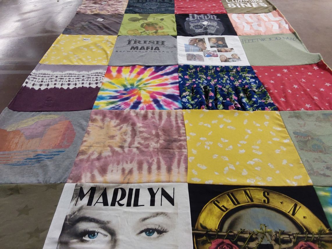 T-shirt quilt with music, pop culture themes by Amanda from NY