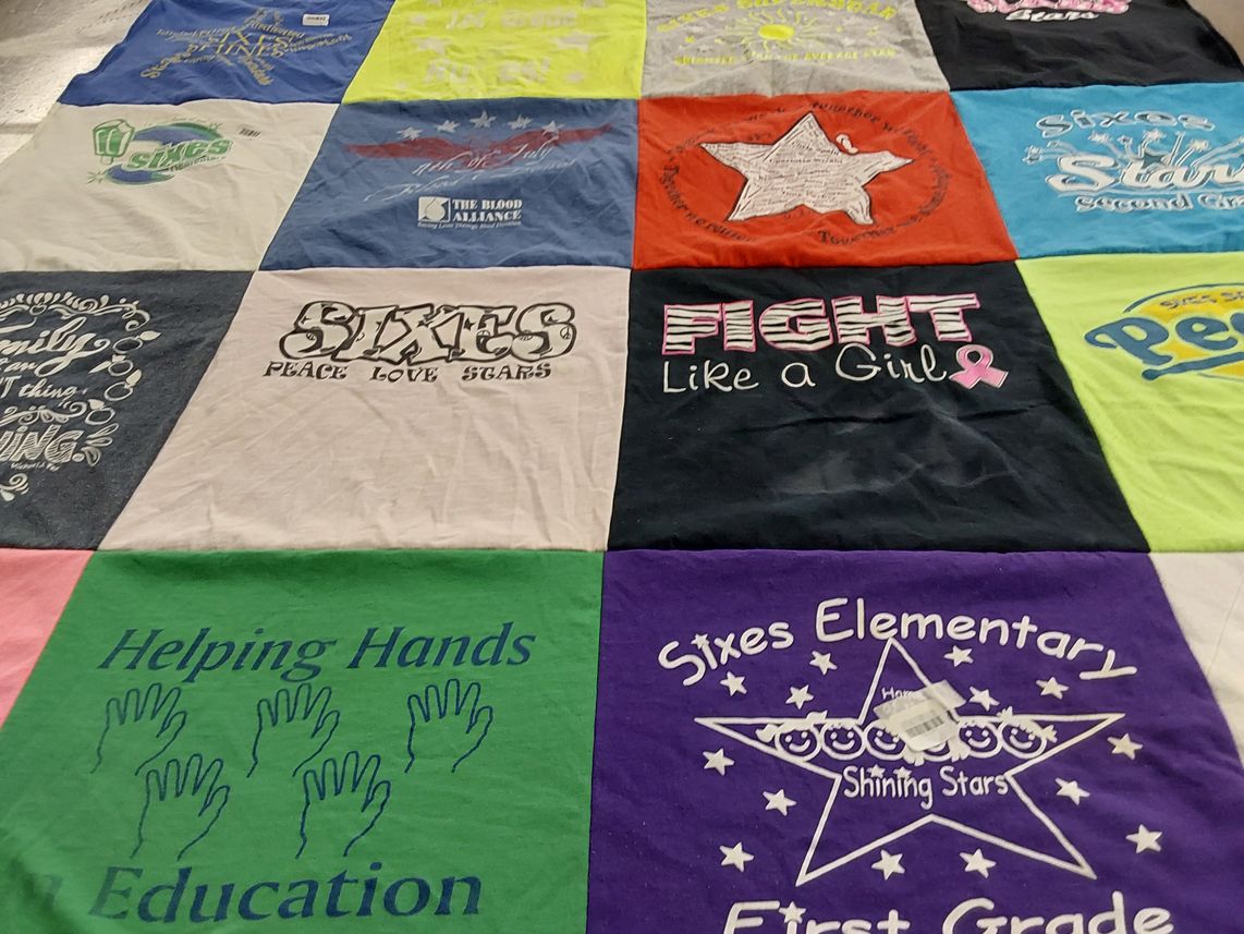 T-shirt quilt from sixes elementary school by Kelsey from GA