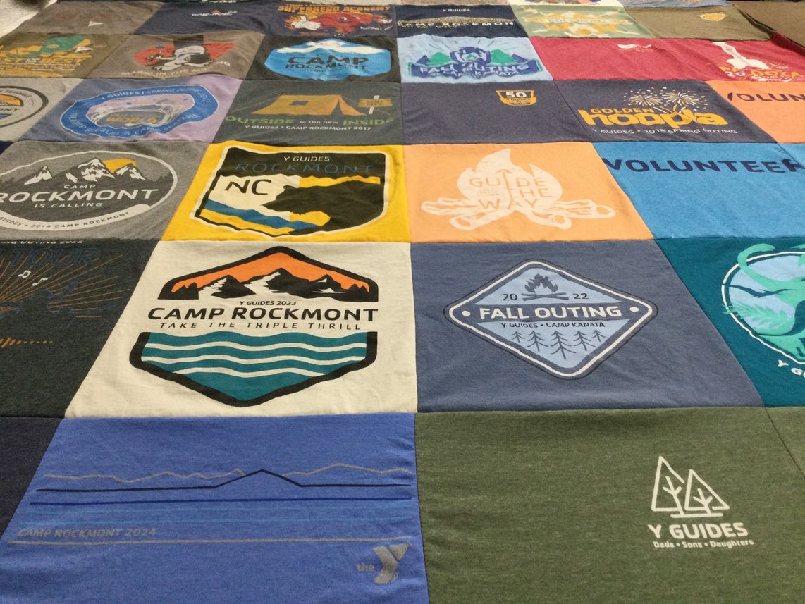 T-shirt quilt with camping, volunteering themes by Mike from NC