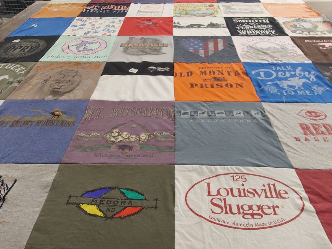 T-shirt quilt with travel, sports themes by Melinda from WA
