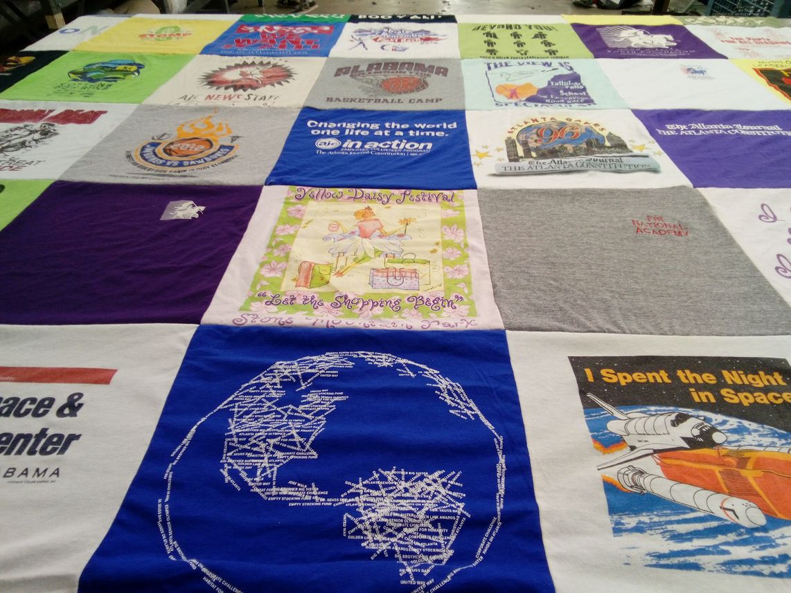 T-shirt quilt with space exploration, basketball themes by Gloria from AL
