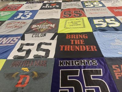 T-shirt quilt featuring sachem sharks football by Laura from NY
