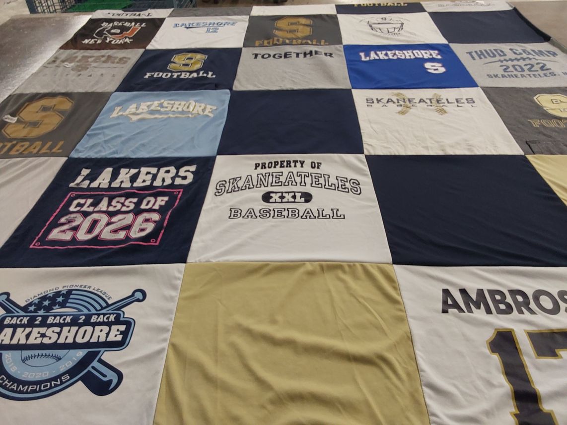 T-shirt quilt featuring lakeshore football team, skaneateles baseball team by Allison from NY
