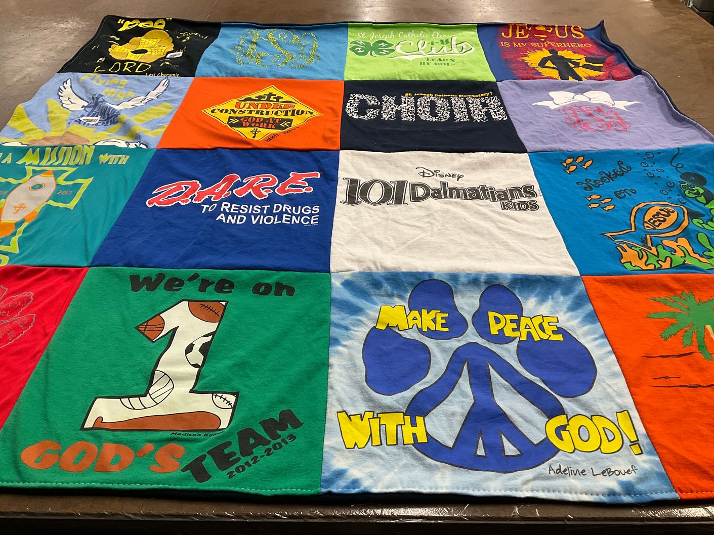 T-shirt quilt with religion, drugs themes by Charlotte from LA