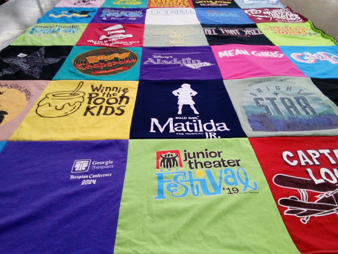 T-shirt quilt with theater, musicals themes by Tiffani from GA