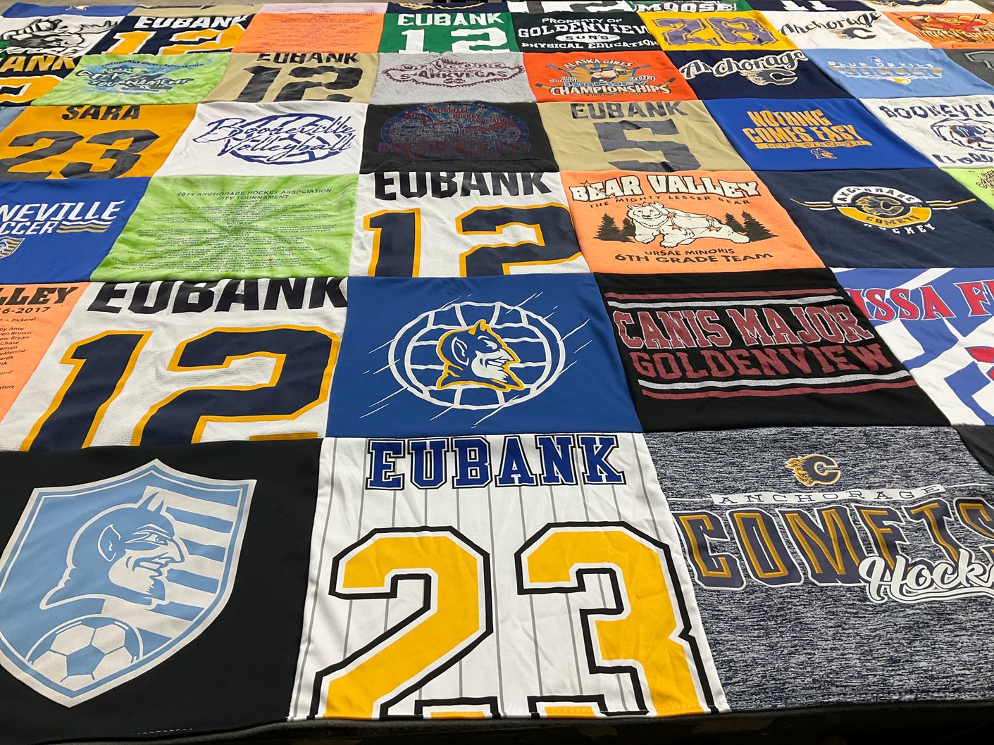 T-shirt quilt featuring anchorage comets hockey team, eubank soccer team by Sherry from TX