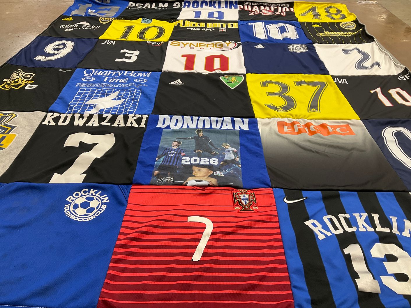 T-shirt quilt with soccer, youth sports themes by Jenny from CA
