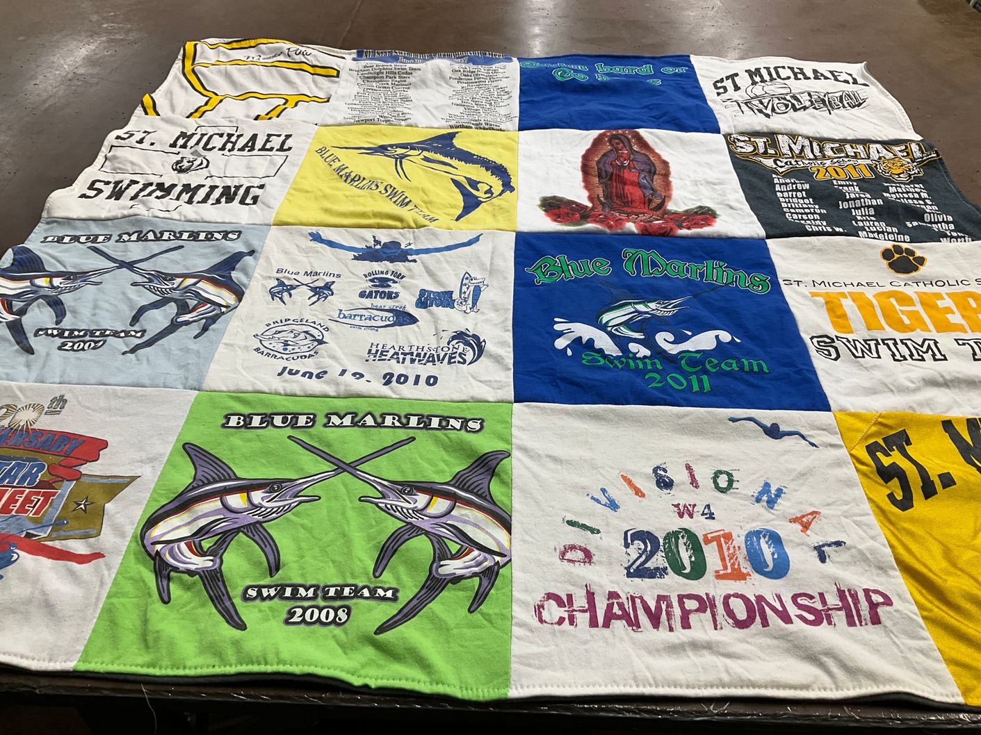 T-shirt quilt featuring blue marlins swim team by Vernon from TX