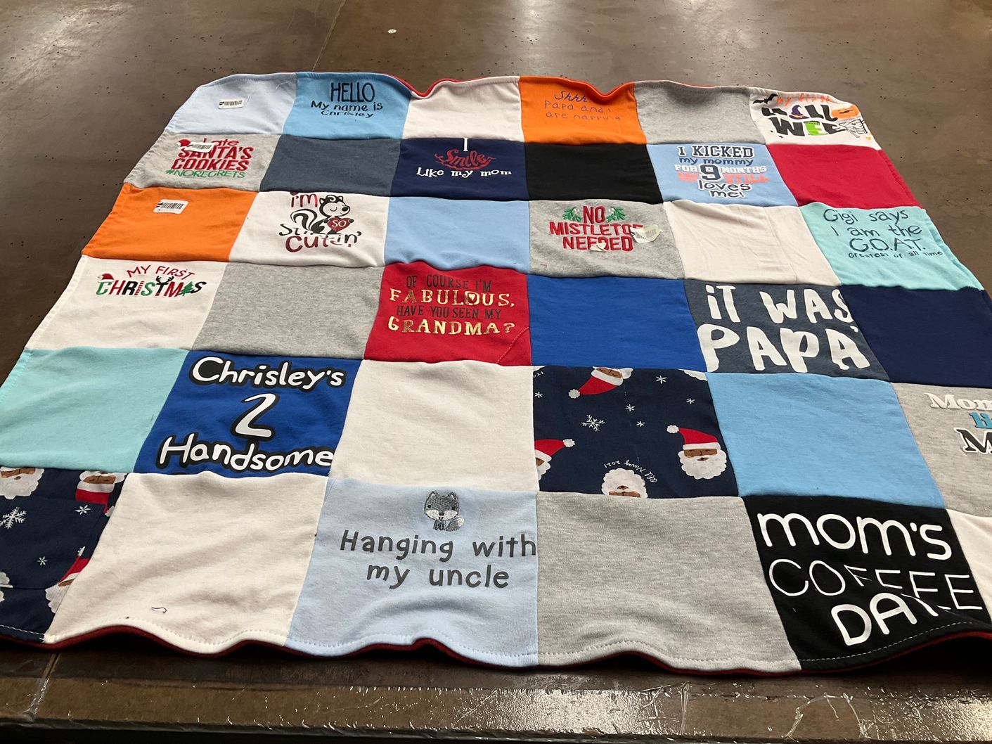 T-shirt quilt with holiday, family themes by Justina from AR