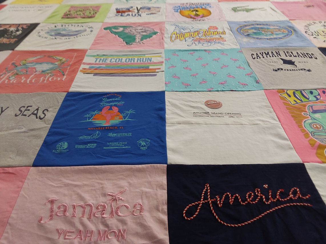 T-shirt quilt with travel, beaches themes by Ann from FL