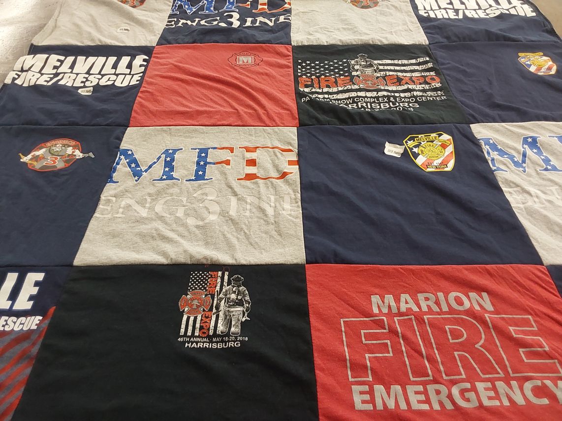 T-shirt quilt with firefighting, emergency services themes by Samantha from NY
