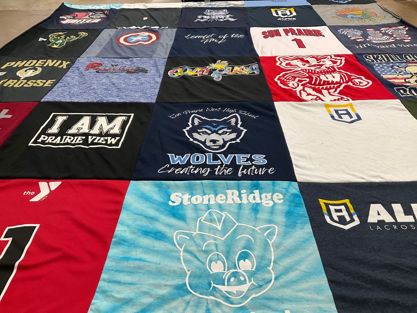 T-shirt quilt featuring sun prairie high school by Tara from WI