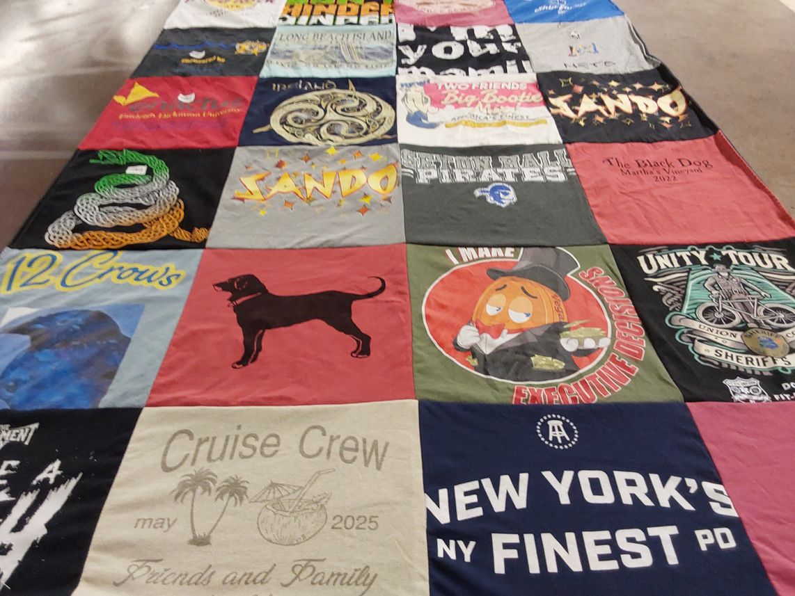 T-shirt quilt with fitness, travel themes by Ed from NJ