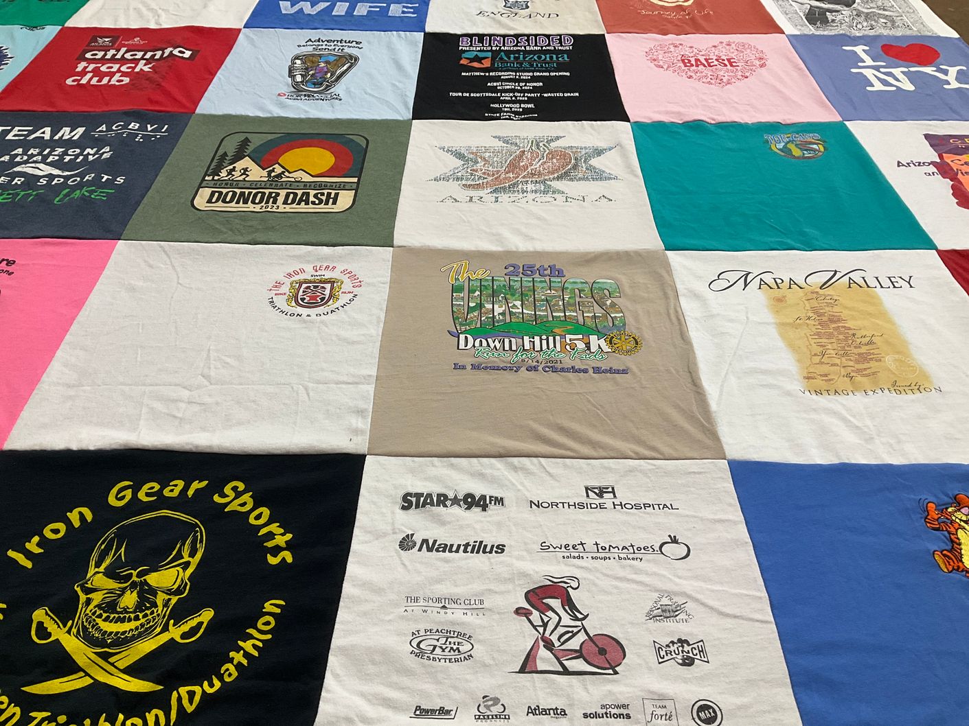 T-shirt quilt with running, sports themes by Kathy from AZ