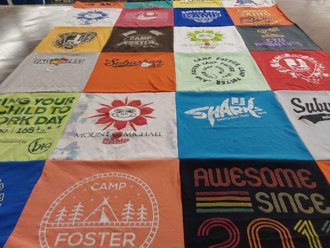 T-shirt quilt featuring jj sharks swim and dive team by Kristin from NE