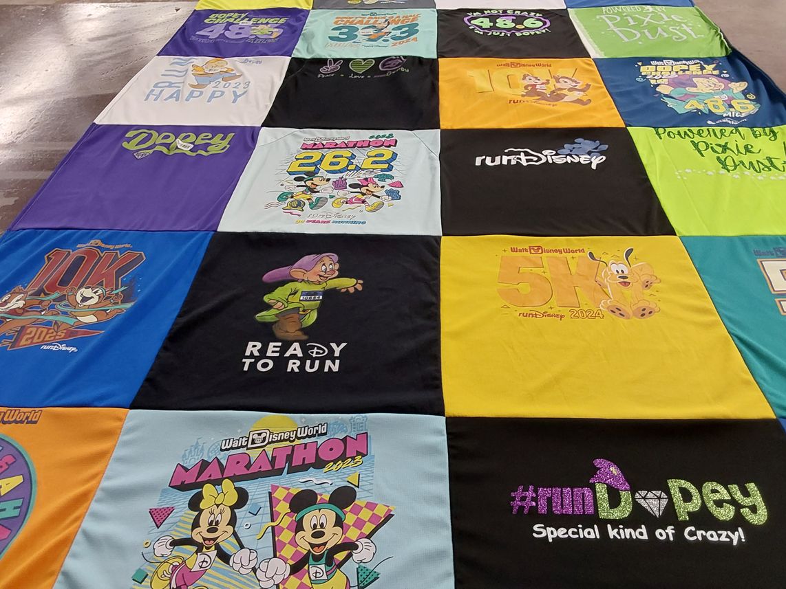 T-shirt quilt with running, disney themes by Stephanie from TX
