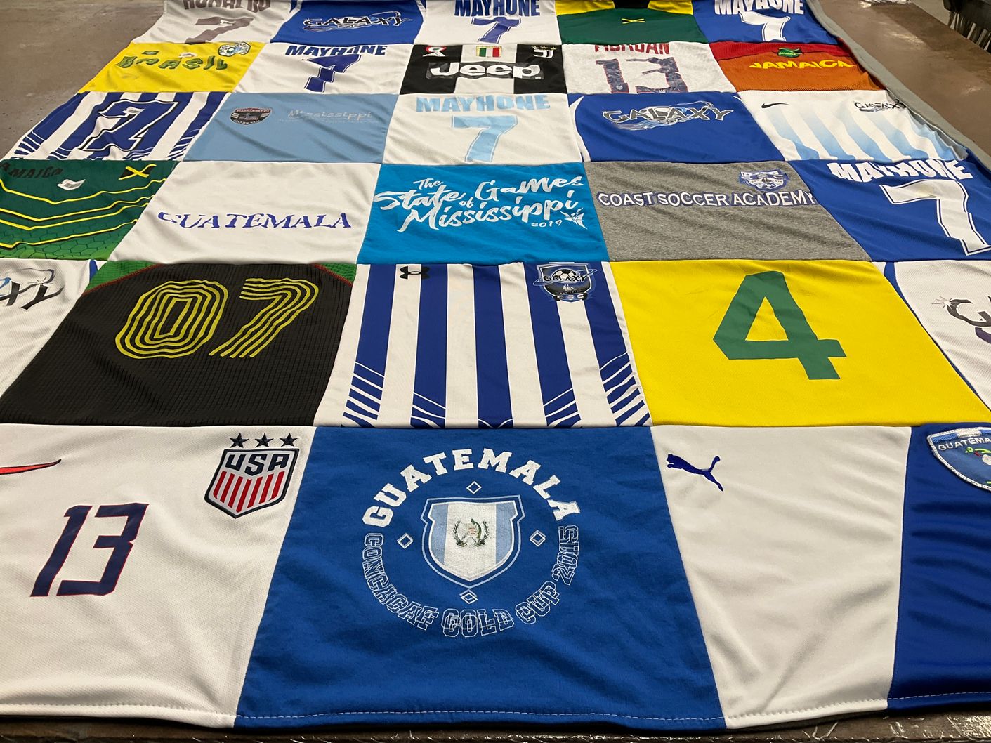 T-shirt quilt with soccer themes by Kyla from MS