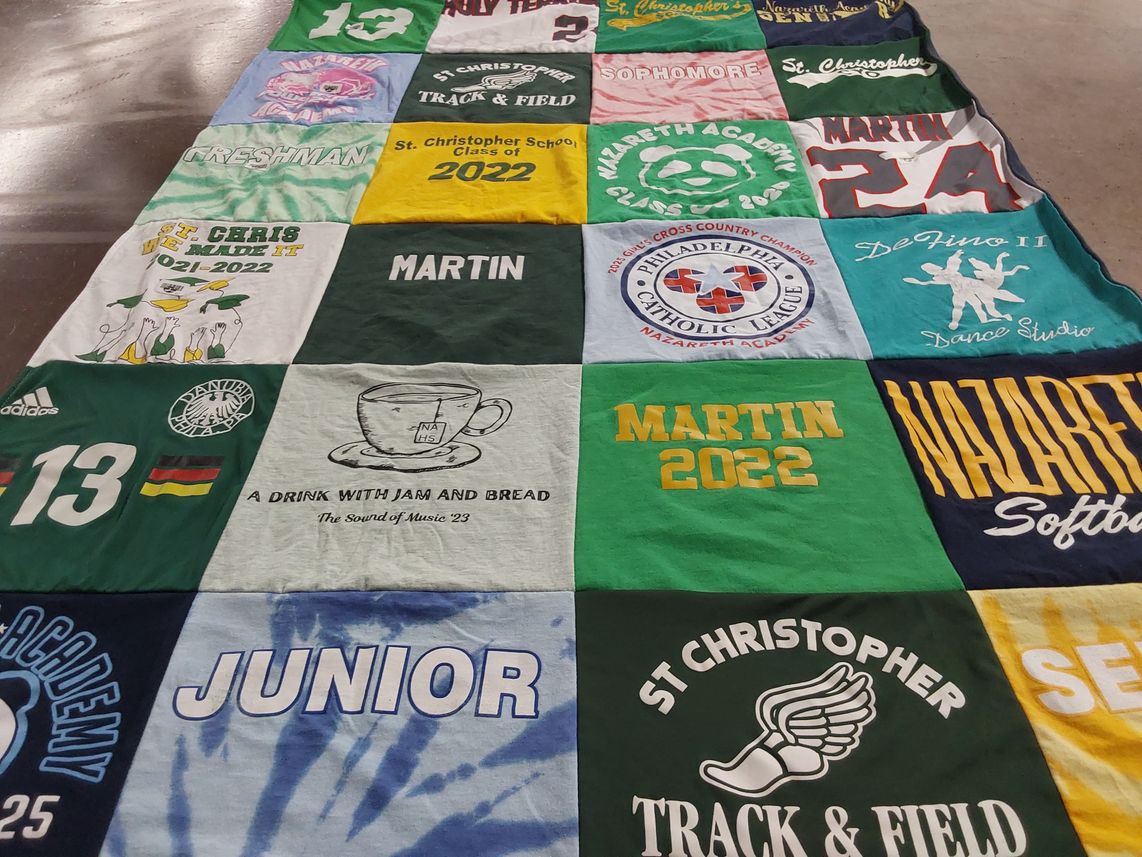 T-shirt quilt featuring st christopher track and field, nazareth softball by Sara from PA