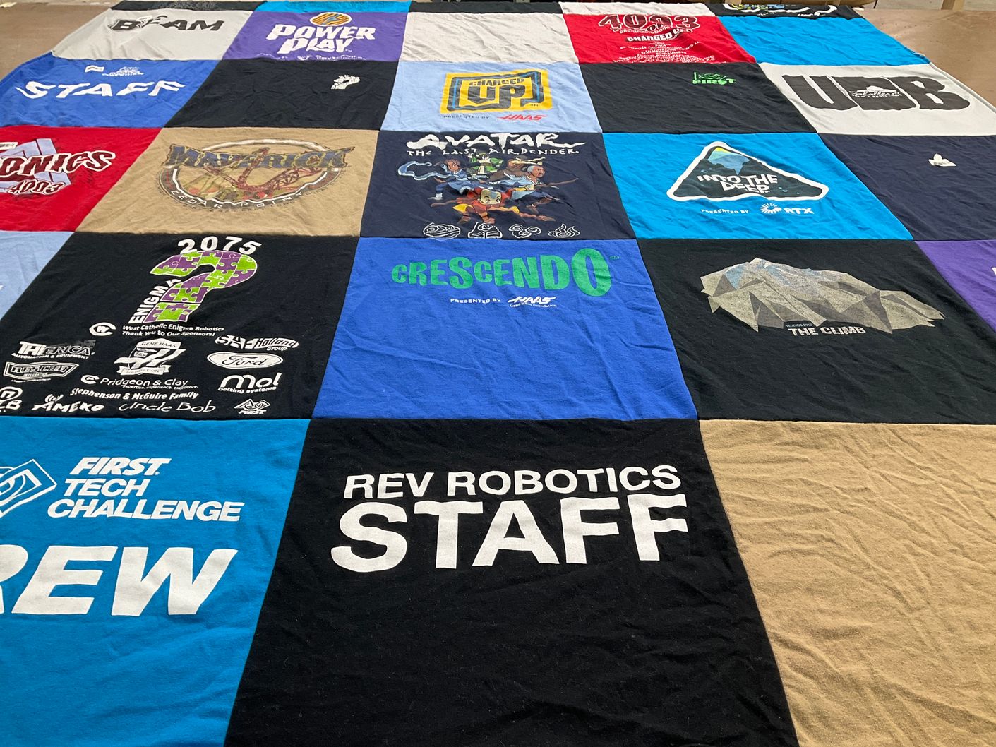T-shirt quilt with robotics, engineering themes by Kimberly from NJ