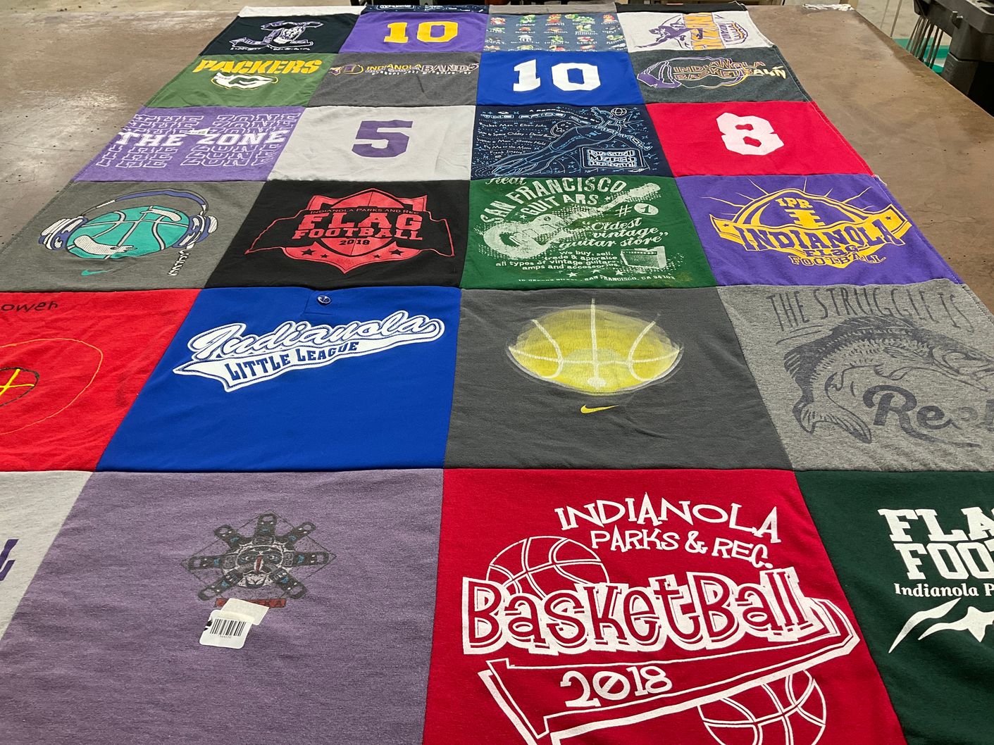 T-shirt quilt with sports, youth sports themes by Heidi from IA