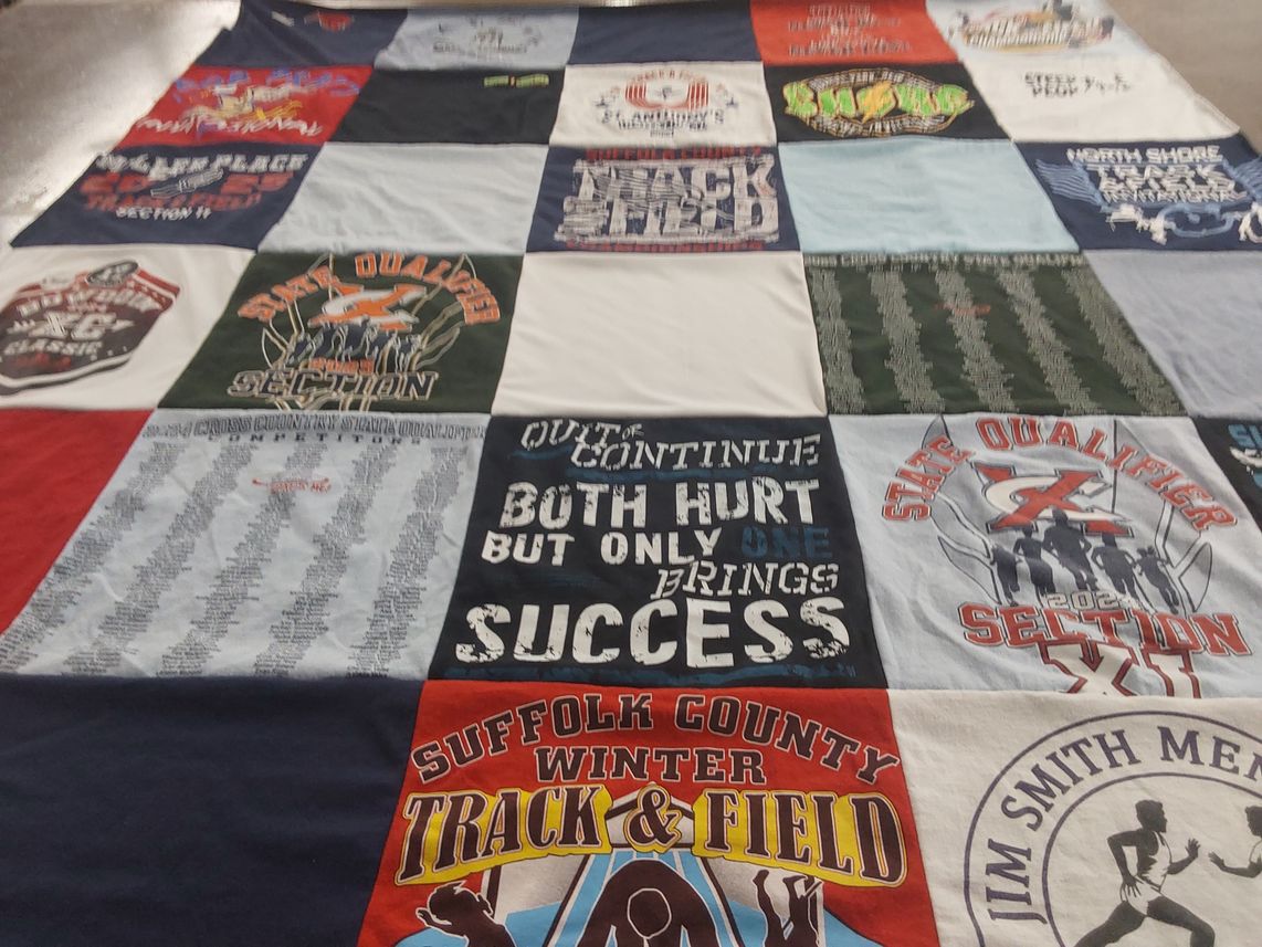 T-shirt quilt with running, track and field themes by Ann-Marie from NY