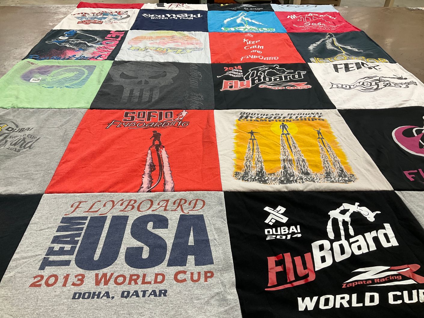 T-shirt quilt with water sports, flyboarding themes by Jamie from TX