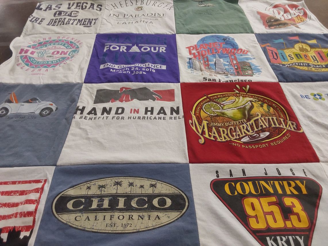 T-shirt quilt with hurricane relief, health awareness themes by Merril from CA
