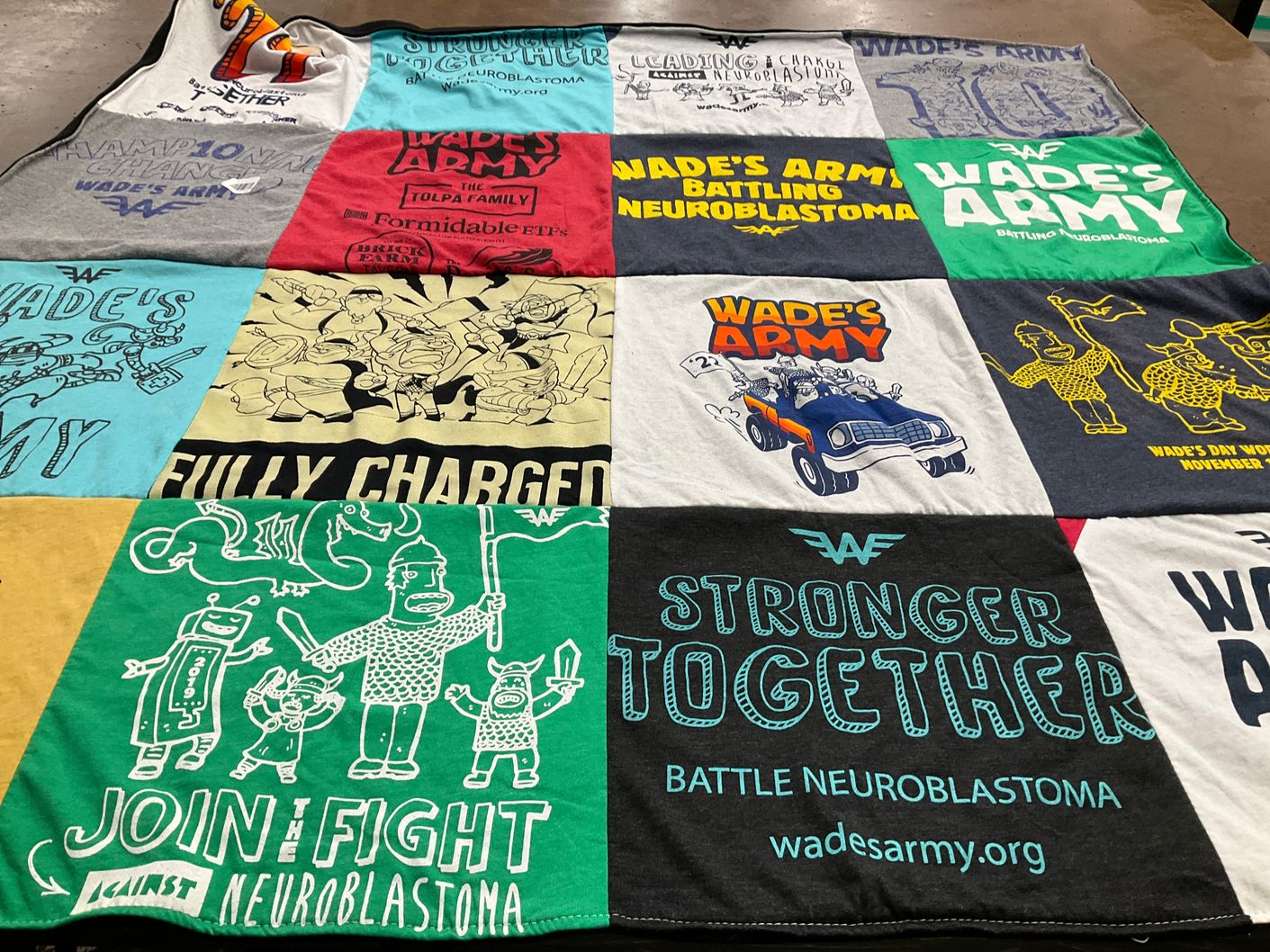 T-shirt quilt with childhood cancer, fundraising themes by Heather from NJ