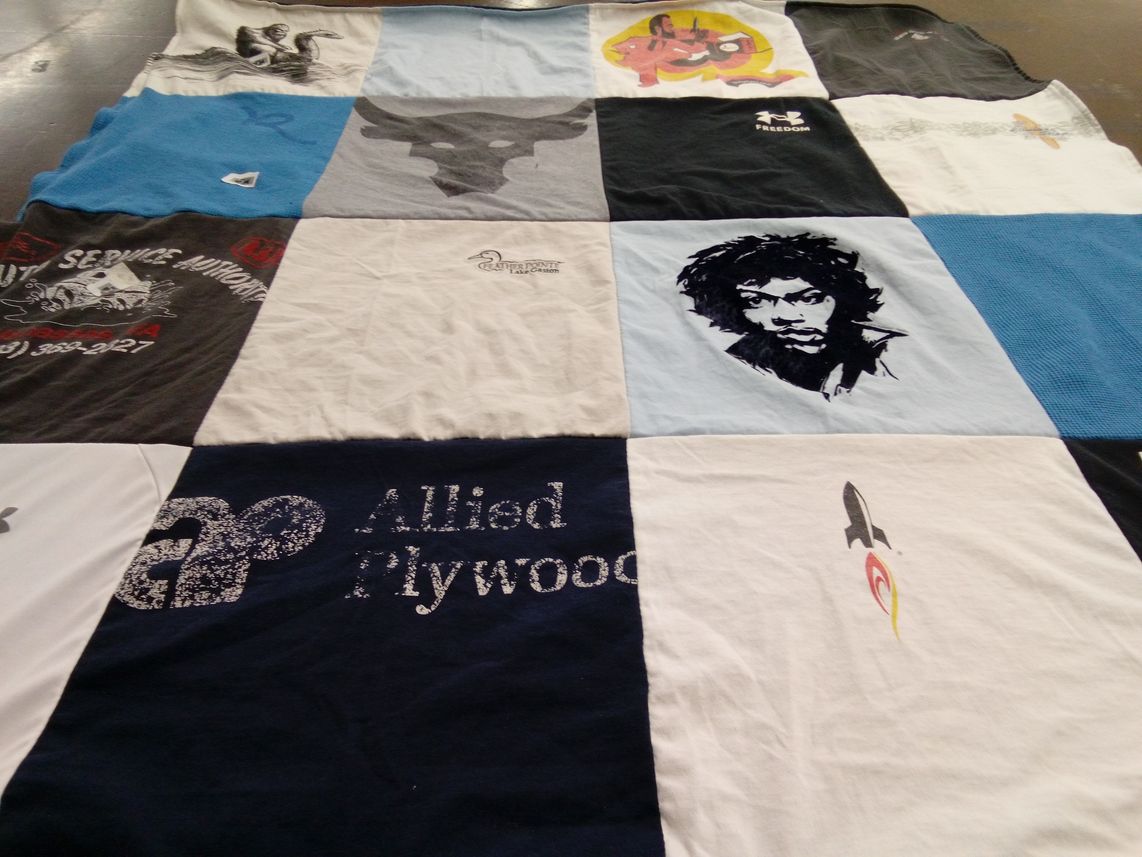 T-shirt quilt with art, music themes by Kim from VA