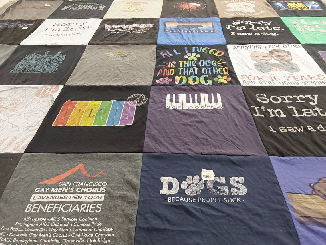 T-shirt quilt with pets, lgbtq+ themes by Hollis from CA